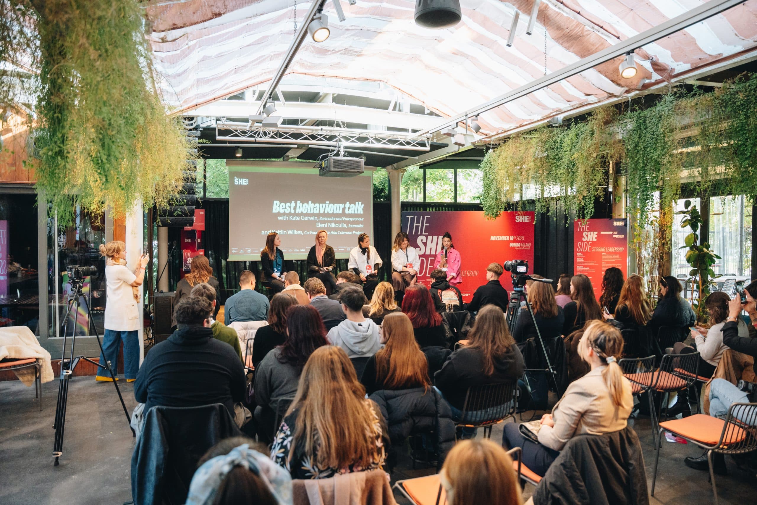 The She Side audience filling the room during a talk